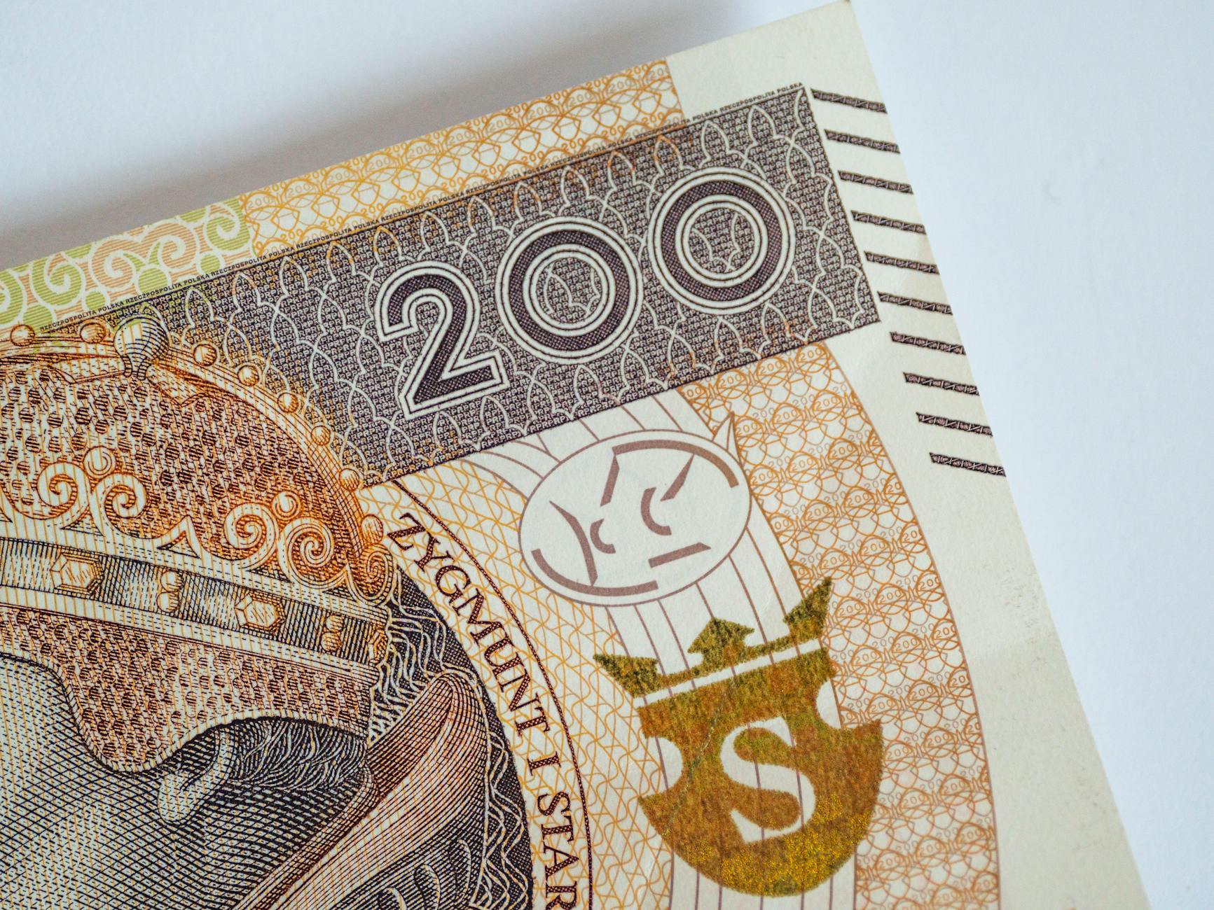 Ilustracja przedstawiająca kalendarz pyleń i symbol bezpieczeństwa w kontekście miasta Luboń.